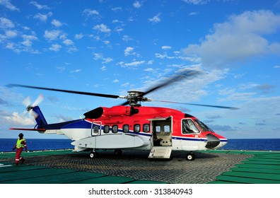 An offshore helicopter at an offshore oil rig