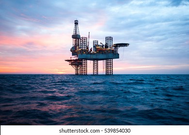 Offshore Jack Up Rig in The Middle of The Sea at Sunset Time - Shutterstock ID 539854030