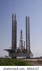 Offshore Jack Up Rig In Port For Service.