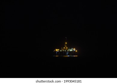 Offshore Oil Drilling Platform In Pitch Darkness