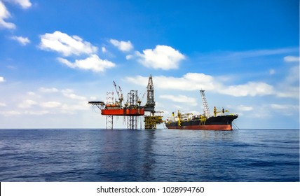 Offshore Oil Field Area Viewed With FPSO Ship And Drilling Rig On Platform