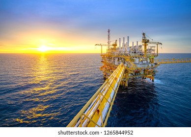 Offshore oil and gas rig platform with beautiful sky in the gulf of Thailand. - Shutterstock ID 1265844952