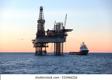 Offshore oil rig drilling platform - Shutterstock ID 515466226