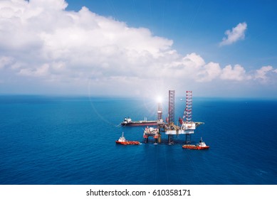 Offshore Oil Rig Platform In The Gulf From Aerial View.
