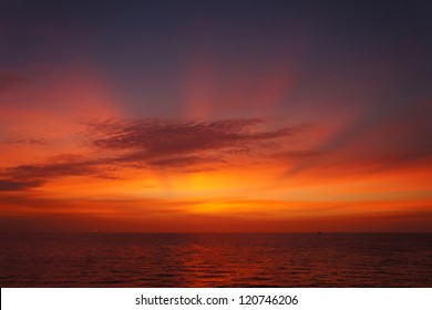 Offshore Sun Set (Red And Yellow Sky)