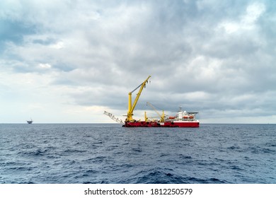 Offshore Terengganu, Malaysia - May 20, 2017: A derrick work barge with 3000 tonne crane preparing for pipeline installation at Malaysia oil field.
