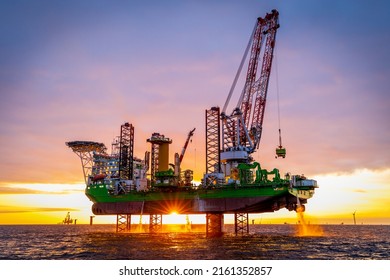 Offshore wind farm installation vessel - Shutterstock ID 2161352857