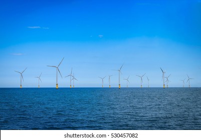 Offshore Wind Turbine In A Wind Farm Under Construction Off Coast Of England