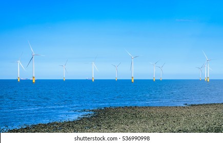 Offshore Wind Turbine In A Wind Farm Under Construction Off The England Coast.