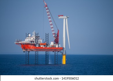 Offshore Wind Turbine In A Windfarm Under Construction  Off The English Coast, North Sea