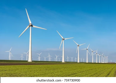 Offshore Windmill farm in the ocean  Westermeerwind park , windmills isolated at sea on a beautiful bright day Netherlands Flevoland Noordoostpolder