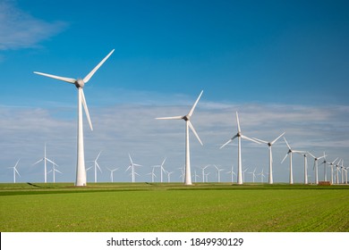 Offshore Windmill Park With Clouds And A Blue Sky, Windmill Park In The Ocean Drone Aerial View With Wind Turbine Flevoland Netherlands Ijsselmeer