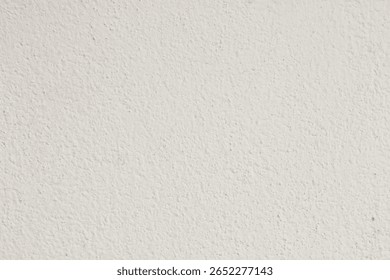 An off-white stucco wall surface featuring a fine, slightly rough texture, ideal as a clean and minimalist background.