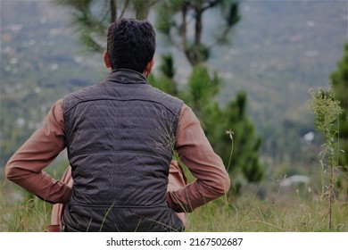 Oghi, Pakistan- 10 17 2021: A Boy Sitting And Looking Forward.