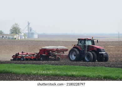 Oglesby, Illinois - USA - May 12, 2022; Case 310 Tractor Pulling A Case 1200 Planter For Corn