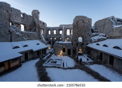 Ogrodzieniec, Silesia, Poland, 12 December 2021:inner Courtyard Of The Castle With Illuminated Figures