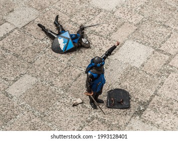 Ogrodzieniec, Silesia, Poland - May 08, 2021: Knight Duel On Castle In Podzamcze. Winner And Defeated.