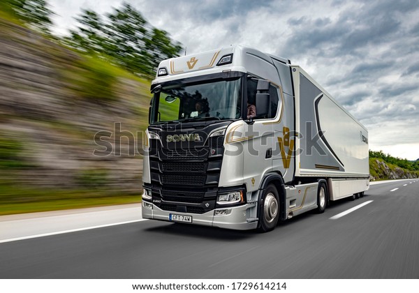 Ogulin, Crotia - May 30, 2019: Scania S650 V8\
driving fast on a highway. This truck is powered by Scania\'s new\
top-of-the-line V8  that has the highest torque and power rating of\
any truck engine.