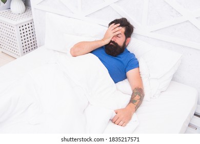 Oh No. Bachelor Has Hangover. Guy At Bedroom. Lazy Sunday. Bed Time Routine. Brutal Male Wake Up With Headache. Relax Lifestyle Concept. Tired Bearded Man In Bed. Early Wake Up At Morning.