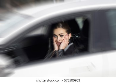 Oh, No! I Hit Someone With My Car. Woman Surprised While Driving. Beautiful Blonde Woman Driving Her Automobile.