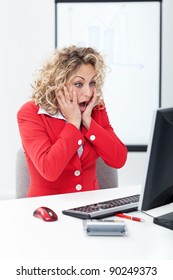 Oh No - Shocked Business Woman In Front Of Computer In The Office