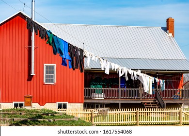 Ohio Amish Country Farm House With Laundry Hanging Out To Dry