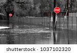 The Ohio River flooding into a street. Black and White with color