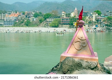 Ohm Sign On A Rock At The Holy River Ganga Near Rishikesh In India Asia