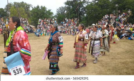 Ohsweken, Ontario, Canada - July 24, 2016 : Six Nations Of The Grand River Pow Wow.  Turtle Island. Powwow Women Traditional Dance In Jingle Dress A Healing Or Medicine Dress. 