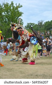 Ohsweken, Ontario, Canada - July 24, 2016 : Six Nations Of The Grand River Pow Wow.  Turtle Island. Grass Dancers, Fancy Feather Dancers Powwow Native American In Their Traditional Regalia.