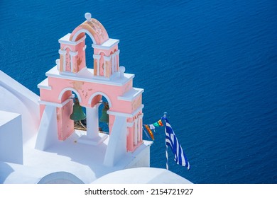 Oia town on Santorini island, Greece. Traditional and famous houses and churches with blue domes over the Caldera, Aegean sea - Shutterstock ID 2154721927