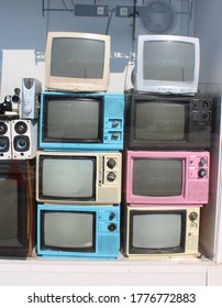 Oido, Korea--July 15, 2020: Vintage Television Sets And Music Equipment Stacked In A Store Window Display