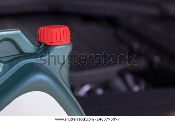 oil bottle and lubricant for cars and\
engines, workshop and\
maintenance