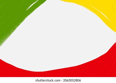 Oil brush green yellow red on white copy space, Reggae background 