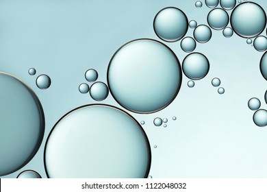 Oil Bubbles On Water Abstract Form In Glass Tank Aqua Colour Tone