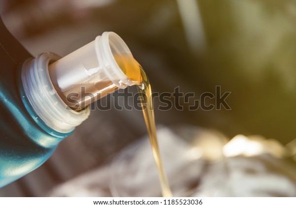 The oil in the canister. The process of replacing the\
engine oil in a car