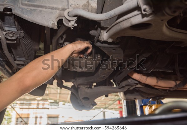 oil change, pouring oil\
to car engine