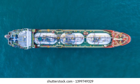 Oil Container Ship On A Green Sea Ocean With Shadow No People And Copy Space Aerial Ariel Drone Uav Birds Eye Top Down View 