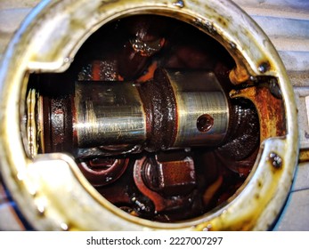 Oil crust in the cylinder head of the car - Shutterstock ID 2227007297