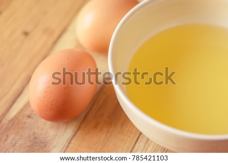 oil in cup and egg food for making sauce salad healthy food