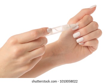 Oil For Cuticle Nails In Hands On A White Background Isolation