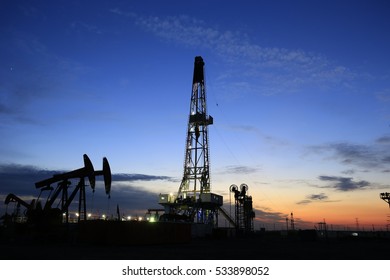 Oil Drilling Platform In The Beautiful Night