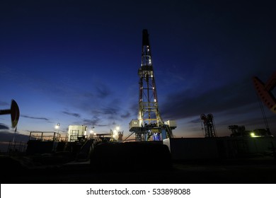 Oil Drilling Platform In The Beautiful Night