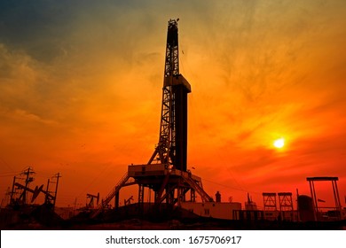 Oil Drilling Rig In The Evening