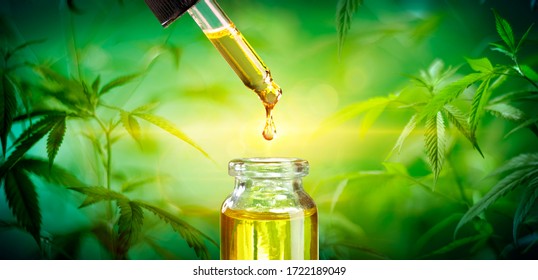Oil Drop Falling In Bottle - Cannabis Extract