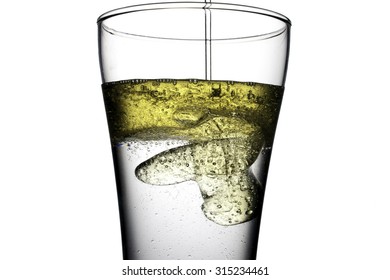 Oil Drop With Water In The Glass