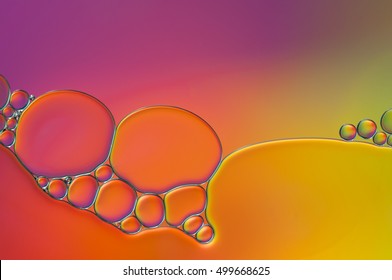 Oil Drops On A Water Surface Abstract Background