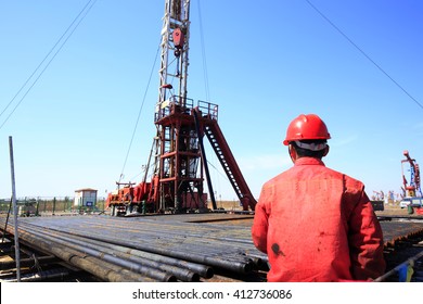 Oil field, the oil workers are working