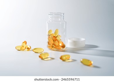 oil filled capsule, soft gel, Fish oil supplement capsule in clear plastic bottle, omega 3 9, vitamin A D - Powered by Shutterstock