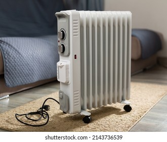 Oil filled radiator used in an room, standing in center of the room